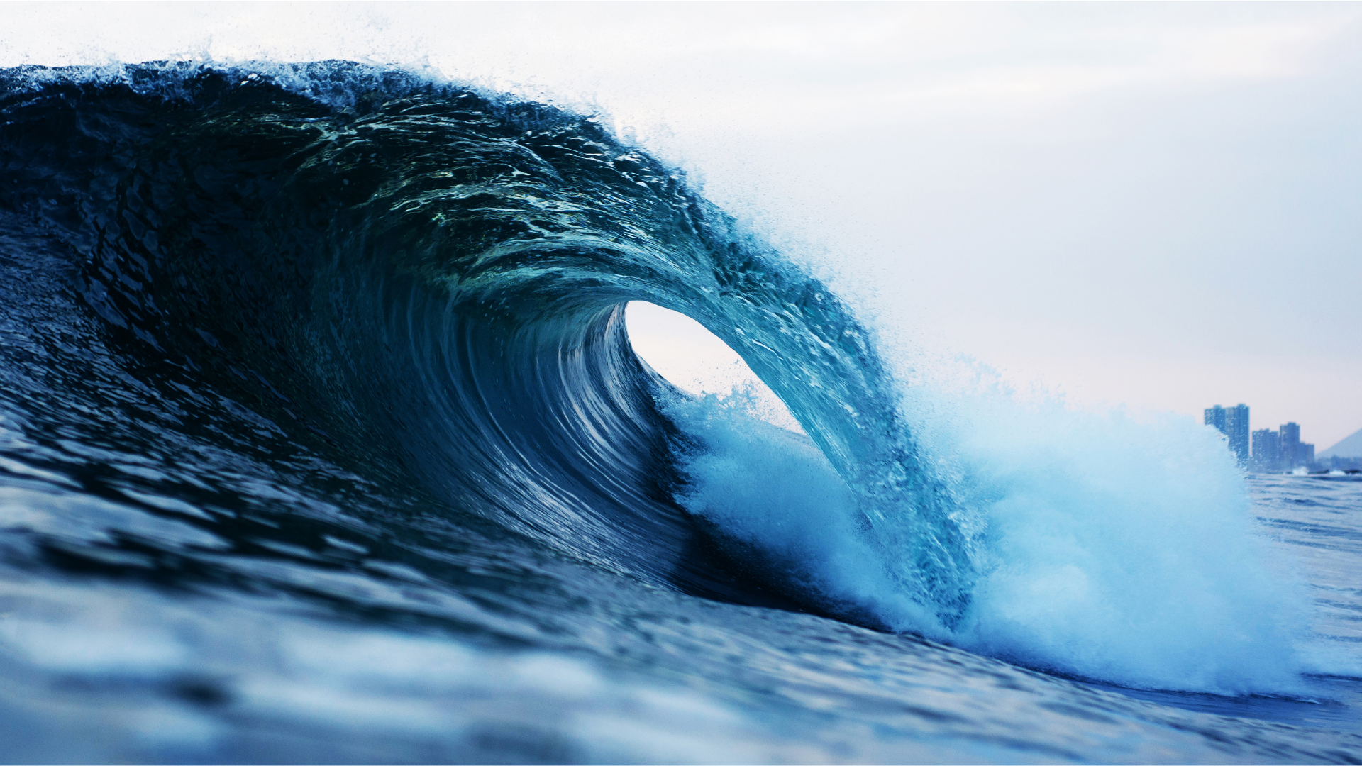 Thai national surfer riding a wave on the Andaman coast